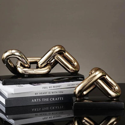 Keramiek sculptuur Art 4 schakel goud/zwart