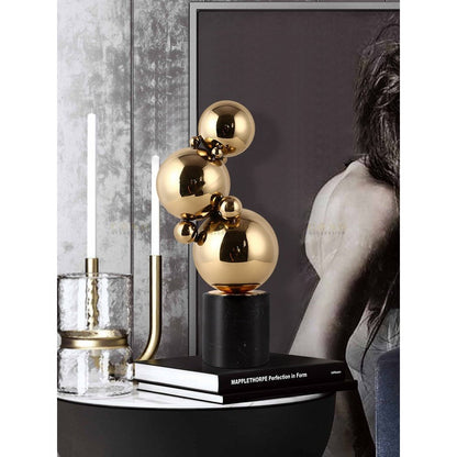 Marmer en messing sculpturen zwart/goud (set van 2)