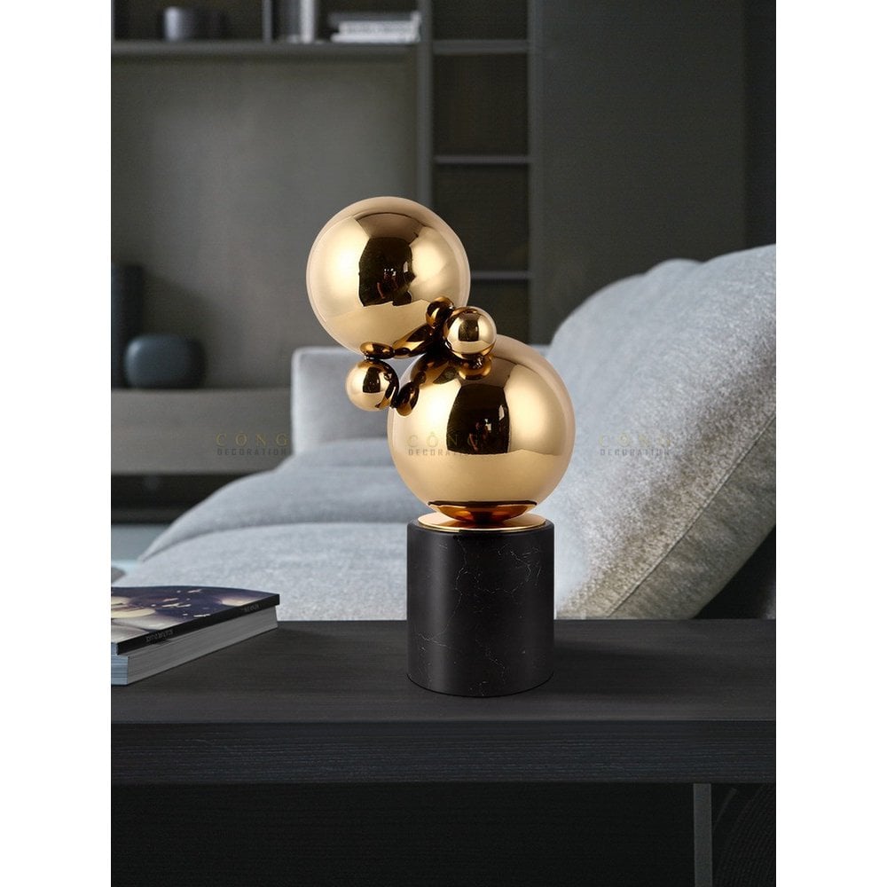 Marmer en messing sculptuur zwart/goud