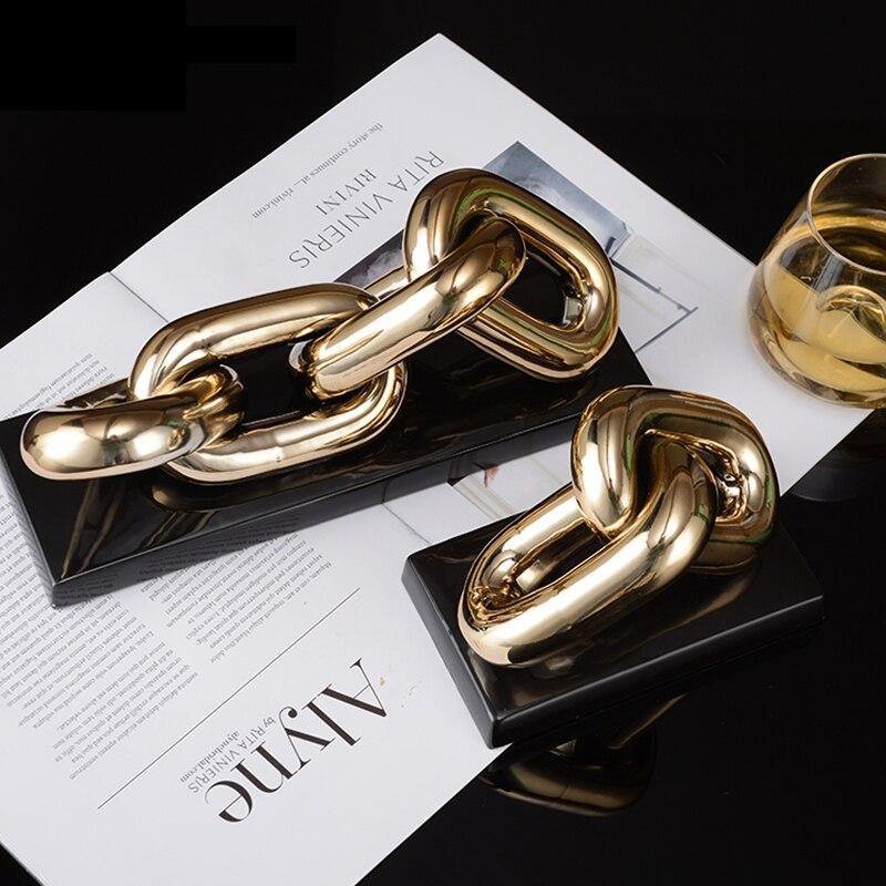 Keramiek sculptuur Art 4 schakel goud/zwart
