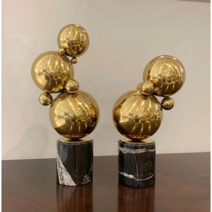 Marmer en messing sculpturen zwart/goud (set van 2)
