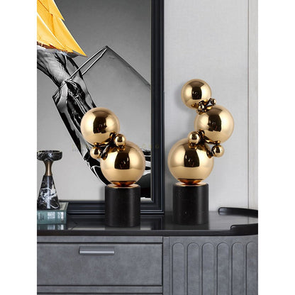 Marmer en messing sculpturen zwart/goud (set van 2)